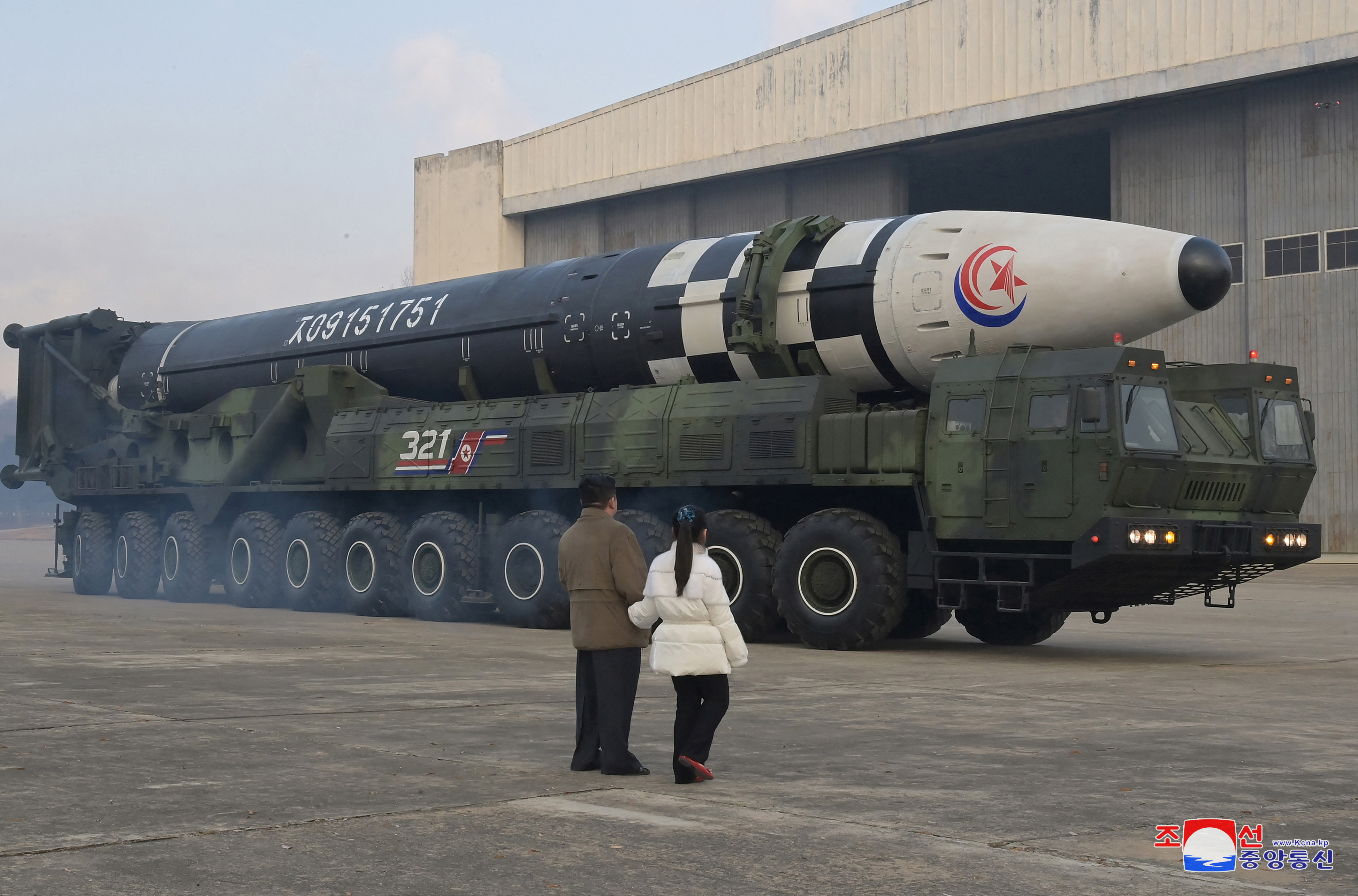 KCNA/REUTERS North Korean leader Kim Jong Un, along with his daughter, inspects an intercontinental ballistic missile in this undated photo released on November 19, 2022.